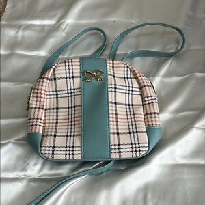 Cream and Blue Backpack with Modern Design